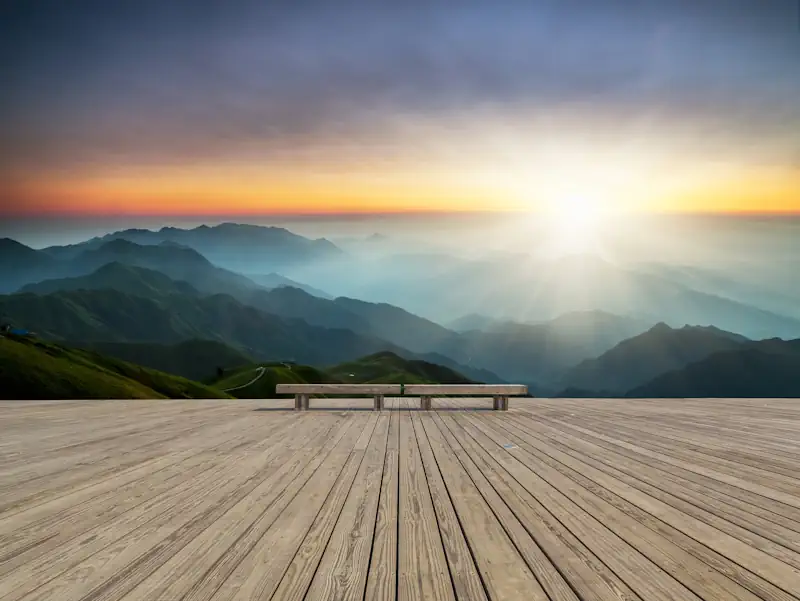 bench in front of sunset